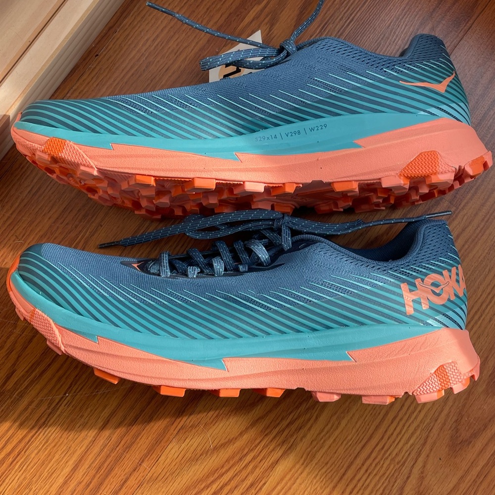 Hoka NWT. I bought the wrong size and forgot to return in time. Blue and orange